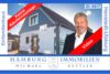 Einfamilienhaus mit Garage + Werkstatt in 24558 Henstedt-Ulzburg - Titelbild mit video