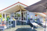 Terrasse hinten - Scandinavischer EBK Bungalow auf ca. 792m² Traum-Grundstück in 23747 Dahme