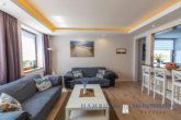 Wohnbereich - Drei Häuser, 10 Apartments, Palmengarten, ca. 1.498 m² Grundst., gepflegte Anlage, in 23747 Dahme