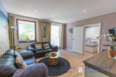 EG: Wohnbereich - Drei Häuser, 10 Apartments, Palmengarten, ca. 1.498 m² Grundst., gepflegte Anlage, in 23747 Dahme